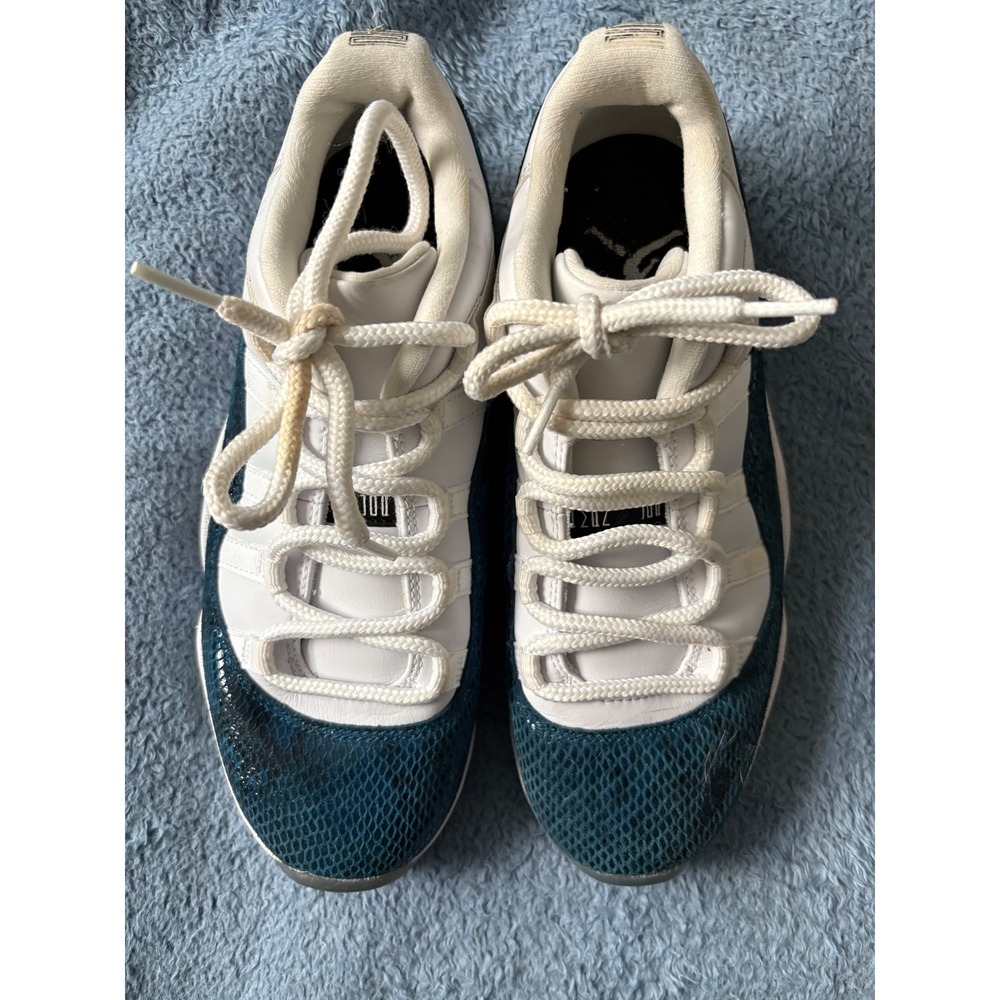 Nike Air Jordan 11s Low Snakeskin Blue 
- Athletic Shoes in White and Teal sz7.5